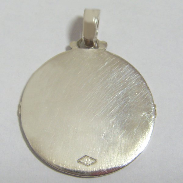 (p1096)Circular silver pendant motif Creole.